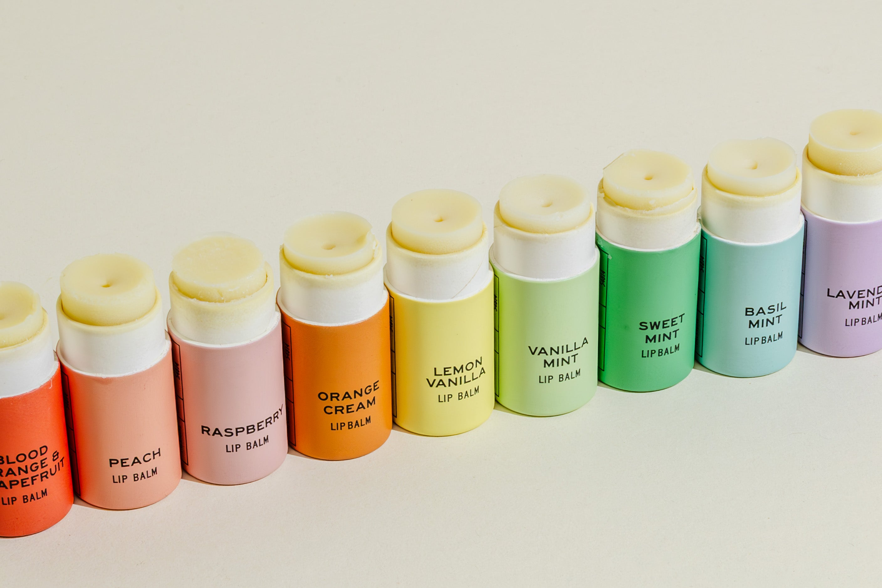 The Good Flower Farm Rainbow Organic Lip Balm Set of 9 features all flavors, each in a colorful, eco-friendly tube made with natural ingredients, including peach, raspberry, orange cream, lemon vanilla, and more.