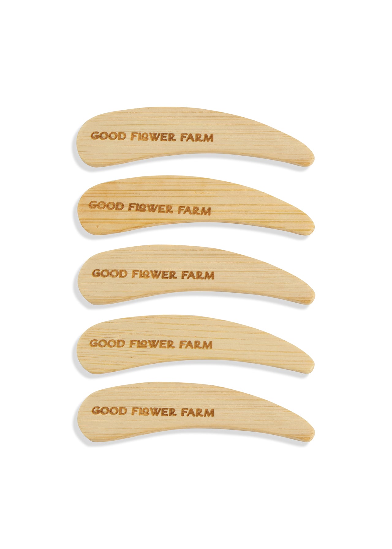 Set of 5 Reusable Bamboo Spatulas by Good Flower Farm, each engraved with the brand name and neatly arranged vertically on a white background—ideal for applying deodorant.