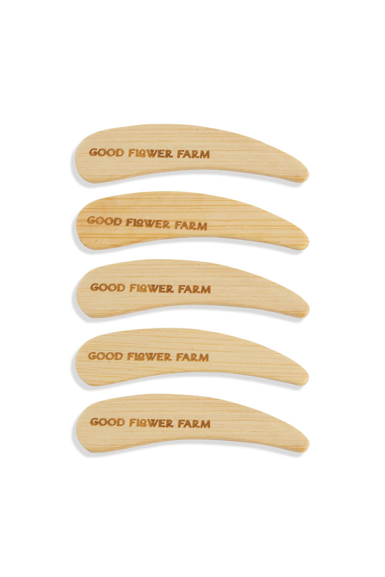 Set of 5 Reusable Bamboo Spatulas by Good Flower Farm, each engraved with the brand name and neatly arranged vertically on a white background—ideal for applying deodorant.